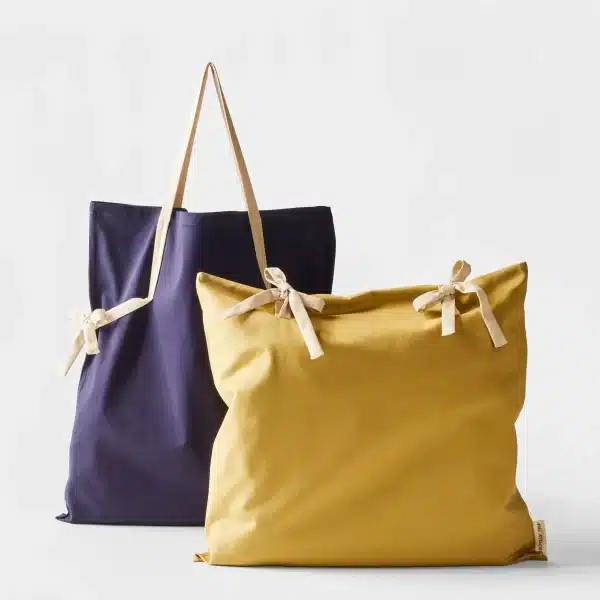 yellow and navy gifting tote bags with ribbon ties