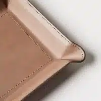 closeup of leather catchall tray stitching and corner details