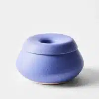 compact cobalt blue ceramic olive pit holder with a unique, modern lid design for efficient pit storage