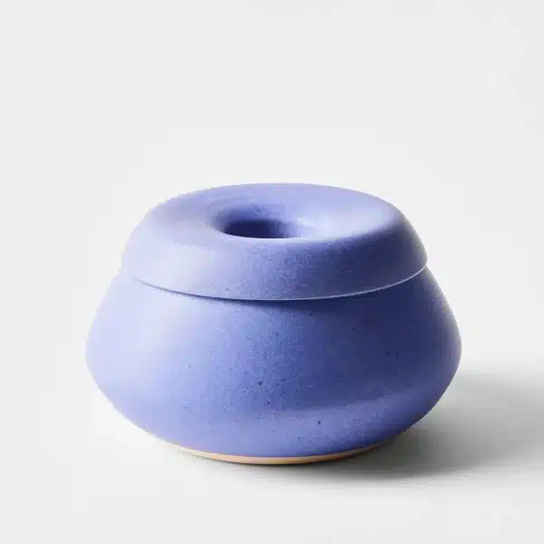 compact cobalt blue ceramic olive pit holder with a unique, modern lid design for efficient pit storage